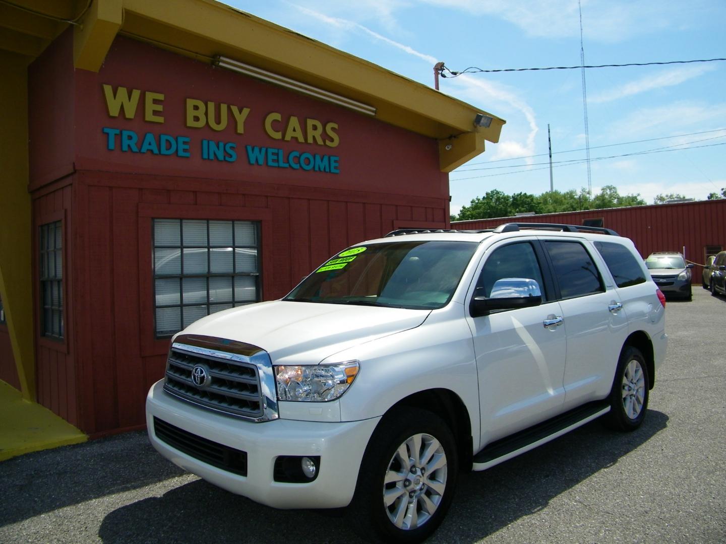 2015 White /Brown Toyota Sequoia Plantium 4WD FFV (5TDDW5G19FS) with an 5.7L V8 DOHC 32V FFV engine, 6-Speed Automatic transmission, located at 4000 Bee Ridge Road, Sarasota, FL, 34233, (941) 926-0300, 27.298664, -82.489151 - Photo#0